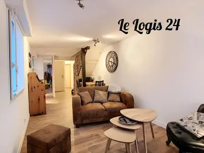 Coin salon dans l'établissement LA SUITE 22 BIS