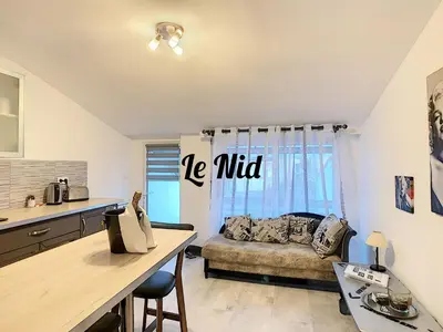 Coin salon dans l'établissement LA SUITE 22 BIS
