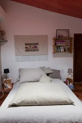 Un ou plusieurs lits dans un hébergement de l'établissement L'instant jardin