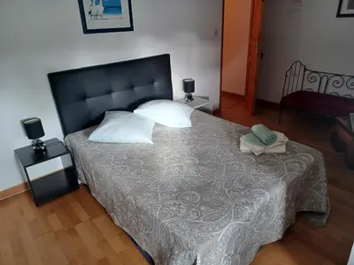Un ou plusieurs lits dans un hébergement de l'établissement La haye Georget