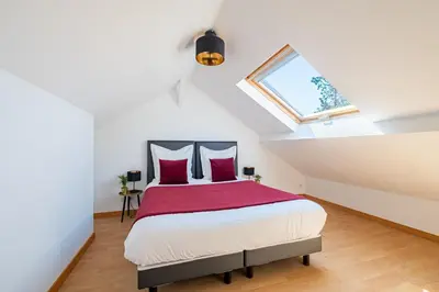 Un ou plusieurs lits dans un hébergement de l'établissement Marc's Flat - Calm & Cosy
