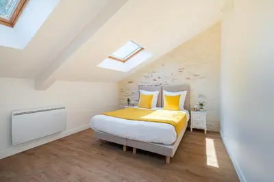 Un ou plusieurs lits dans un hébergement de l'établissement Marc's Flat - Calm & Cosy