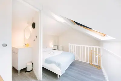 Un ou plusieurs lits dans un hébergement de l'établissement Le Trendy - Duplex pétillant : Place Graslin / Dobrée
