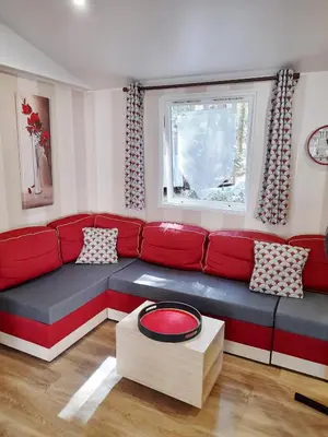 Coin salon dans l'établissement HOME-COSY - 6 pers - 40 m2 3 CH - 2 SDB et 2 WC
