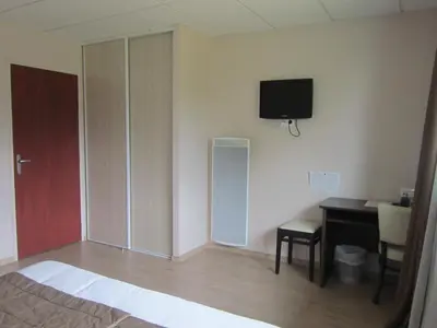 Télévision ou salle de divertissement dans l'établissement Appartements Studios VILLA DES MARAIS 1 à 2 personnes proche du Lac de GrandLieu
