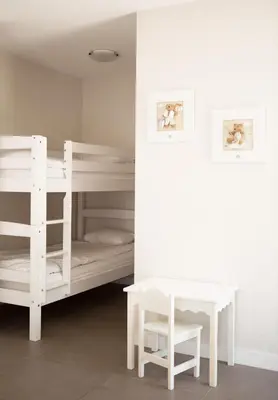 Un ou plusieurs lits dans un hébergement de l'établissement Hotel Autre Mer