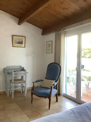Coin salon dans l'établissement Maison 4 adultes et 4 enfants - 250m de la plage