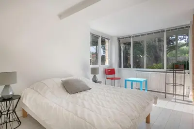 Un ou plusieurs lits dans un hébergement de l'établissement Villa balnéaire pour 8 - 75m de la plage