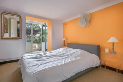 Un ou plusieurs lits dans un hébergement de l'établissement Villa balnéaire pour 8 - 75m de la plage