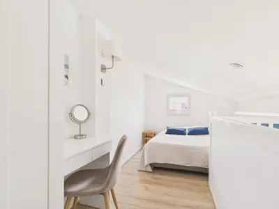 Un ou plusieurs lits dans un hébergement de l'établissement Maison proche Golf plage et piscine à Pornic