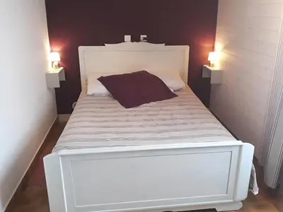Un ou plusieurs lits dans un hébergement de l'établissement Un petit coin de campagne dans le pays de Saint-Gilles