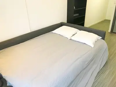 Un ou plusieurs lits dans un hébergement de l'établissement Lodge Nicolas, Hyper Centre