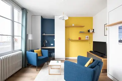 Télévision ou salle de divertissement dans l'établissement Le Cinq by Cocoonr