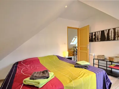 Un ou plusieurs lits dans un hébergement de l'établissement Holiday Home Le Graffi'Ty by Interhome