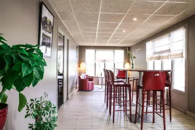 Coin salon dans l'établissement Hôtel Inn Design & Restaurant Nantes