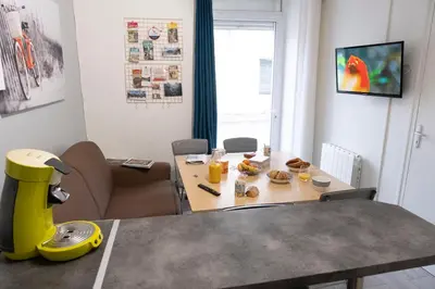 Télévision ou salle de divertissement dans l'établissement L'appart à Mimine