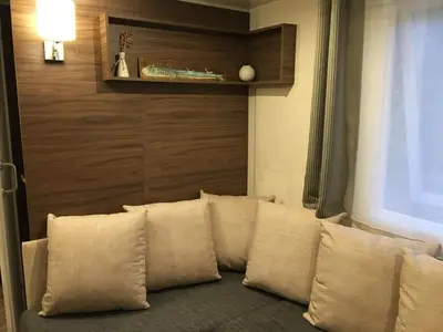 Coin salon dans l'établissement Mobilhome familial 6 à 7 p 3 chambres 42 m2 Saint Brévin Les Pierres Couchées