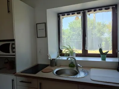 Cuisine ou kitchenette dans l'établissement Gîte La Pâquerie