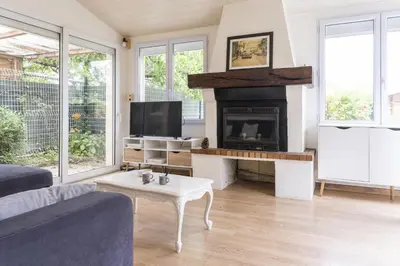 Télévision ou salle de divertissement dans l'établissement Gîte du jardin de Charlotte - Ancenis St Géréon