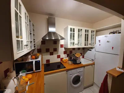 Cuisine ou kitchenette dans l'établissement Les Petites Fontaines au cœur de la Doutre