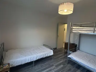Un ou plusieurs lits dans un hébergement de l'établissement Appartement 3 pièces avec balcon, à 300m de la plage, La Guérinière - FR-1-224B-107