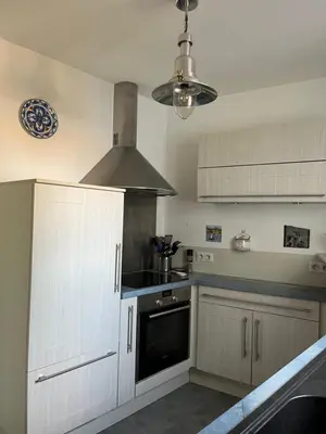 Cuisine ou kitchenette dans l'établissement Le Sableau
