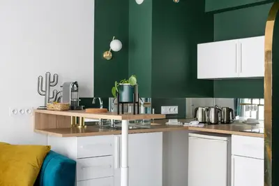 Cuisine ou kitchenette dans l'établissement Jad'Or - avec parking privé
