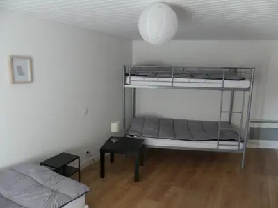 Un ou plusieurs lits dans un hébergement de l'établissement Grand gite du Puy Lambert