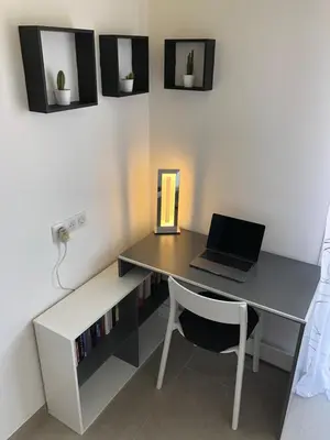 Télévision ou salle de divertissement dans l'établissement Appartement 