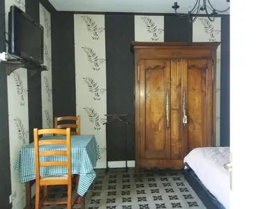Un ou plusieurs lits dans un hébergement de l'établissement chambre meublée à louer