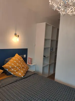 Un ou plusieurs lits dans un hébergement de l'établissement AU GRENIER DE PAULINE
