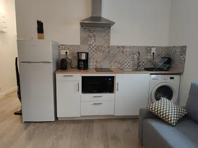 Cuisine ou kitchenette dans l'établissement AU GRENIER DE PAULINE