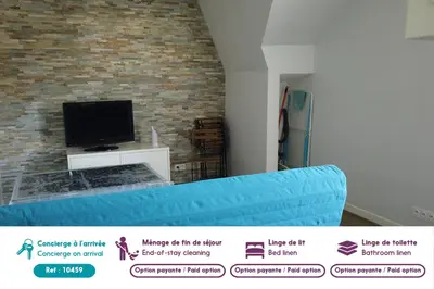 Télévision ou salle de divertissement dans l'établissement Appartement cosy à quelques mètres de la plage