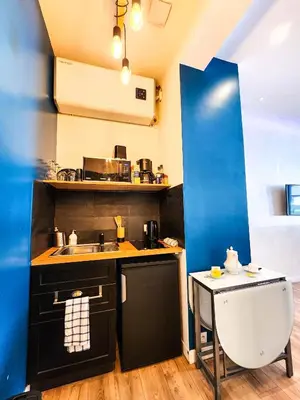 Cuisine ou kitchenette dans l'établissement Le Chateau