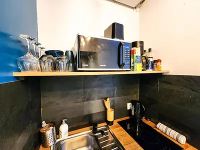 Cuisine ou kitchenette dans l'établissement Le Chateau