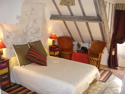 Un ou plusieurs lits dans un hébergement de l'établissement Le PETIT CHATEAU - Tiffauges proche Puy duFou