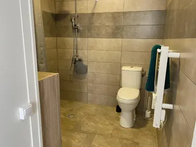 Salle de bains dans l'établissement Hôtel L'Embarcadère