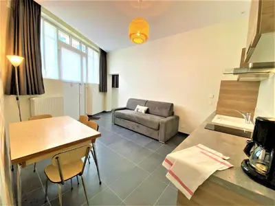 Coin salon dans l'établissement Appartements Rue Sarret XXL