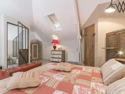 Un ou plusieurs lits dans un hébergement de l'établissement Gîte de charme près de Nantes avec jardin de 2300 m², terrasse privative et vélos à disposition - FR-1-306-798