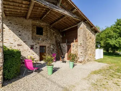 Jardin de l'établissement Charmante maison au cœur du Vignoble Nantais avec wifi - FR-1-306-804