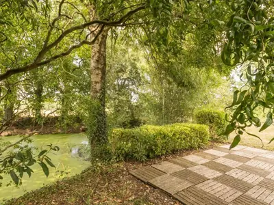 Jardin de l'établissement Charmante maison au cœur du Vignoble Nantais avec wifi - FR-1-306-804