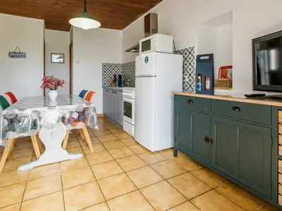 Cuisine ou kitchenette dans l'établissement Gîte Authentique au Cœur des Vignes avec Terrasse Privative et Wifi, à 25 km de Nantes - FR-1-306-813