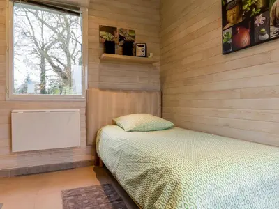 Un ou plusieurs lits dans un hébergement de l'établissement Gîte tout confort avec spa et jardin clos près de Nantes - FR-1-306-849