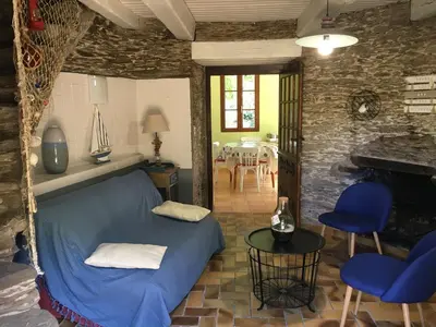 Coin salon dans l'établissement Moulin rénové avec jardin clos près de Pornic - FR-1-306-872