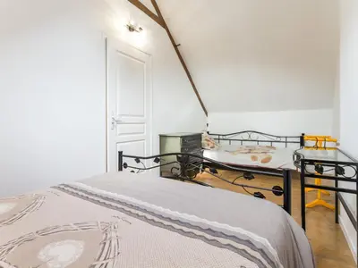 Un ou plusieurs lits dans un hébergement de l'établissement Gîte Charmant en Brière: Proche Guérande, Jardin Privé, 2 Chambres - FR-1-306-941