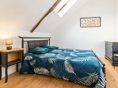 Un ou plusieurs lits dans un hébergement de l'établissement Gîte Charmant en Brière: Proche Guérande, Jardin Privé, 2 Chambres - FR-1-306-941