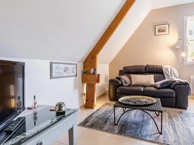 Coin salon dans l'établissement Gîte typique au calme avec jardin paysagé proche Guérande et La Baule, wifi inclus - FR-1-306-937
