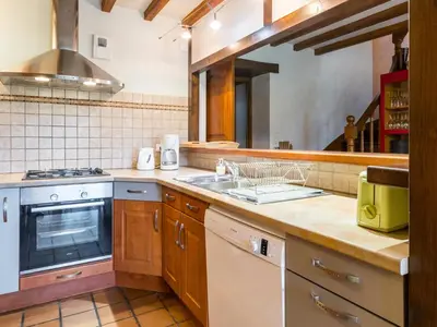 Cuisine ou kitchenette dans l'établissement Maison de Charme au Calme avec Jardin, Idéale Famille, Proche Nantes! - FR-1-306-1008