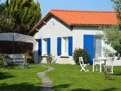 Jardin de l'établissement Maison lumineuse proche Nantes, jardin privatif, parking, Wi-Fi, cuisine équipée, équipements bébé - FR-1-306-1018