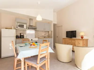 Cuisine ou kitchenette dans l'établissement Maison lumineuse proche Nantes, jardin privatif, parking, Wi-Fi, cuisine équipée, équipements bébé - FR-1-306-1018